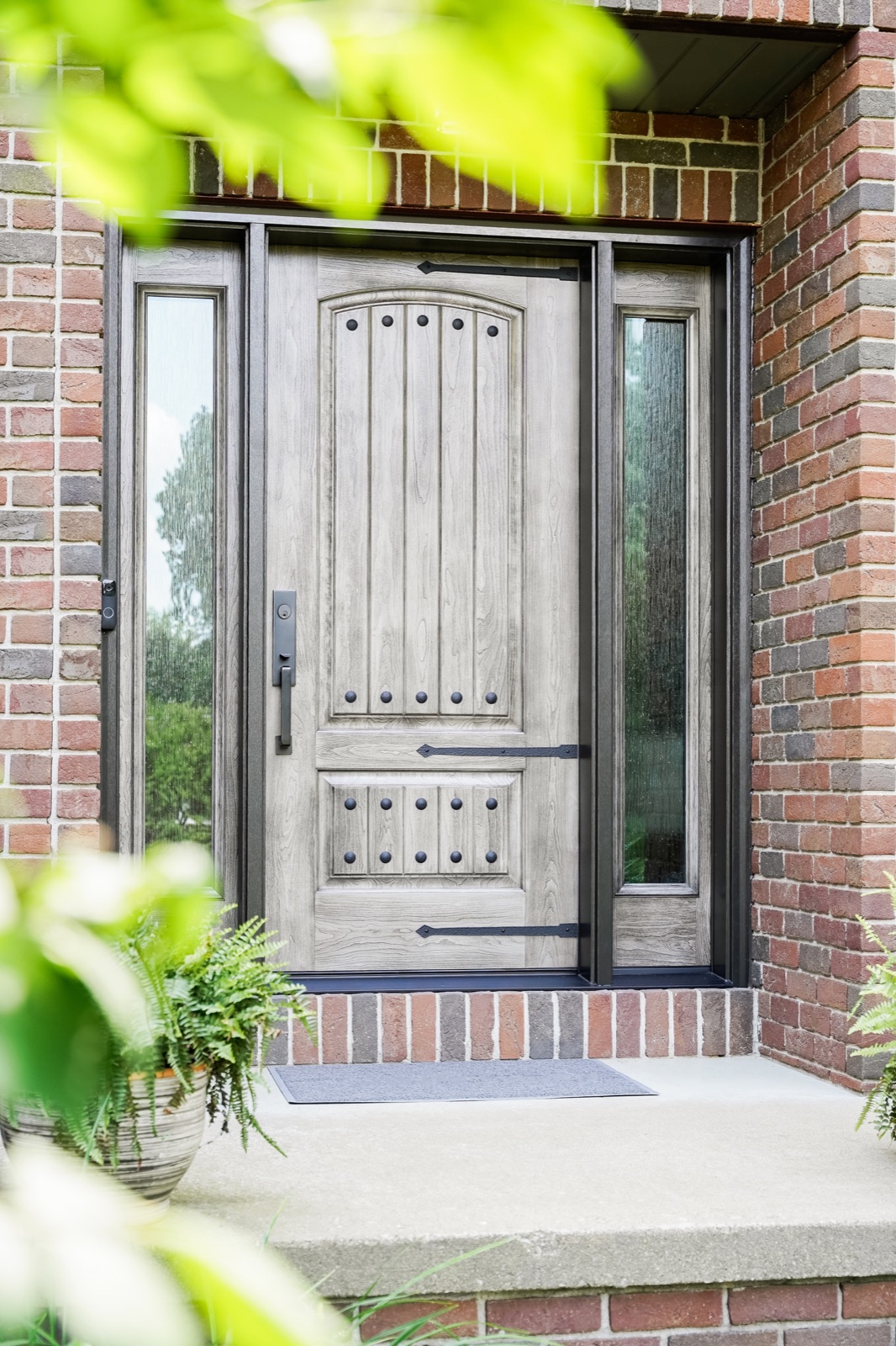 Signet Cherry Natural Leather Waterfall Bronze Davos Handle exterior entry door style option