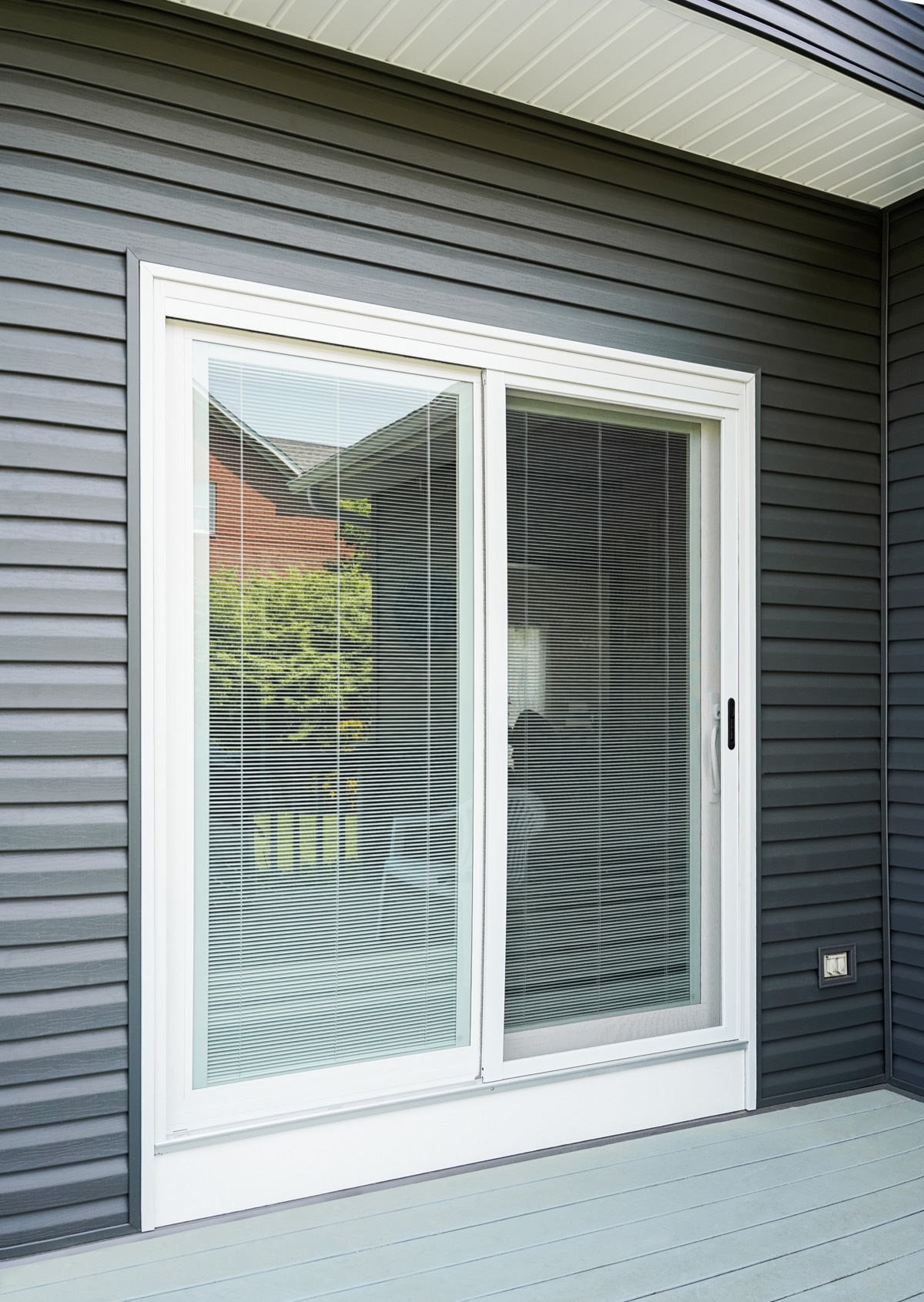 White sliding patio door with internal blinds