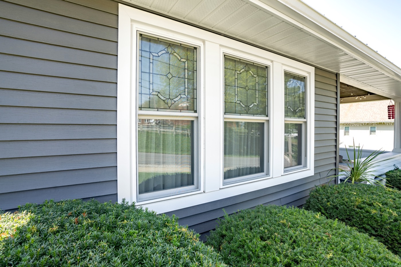 White Endure Double Hung Windows Florence Art Glass replacement window style option